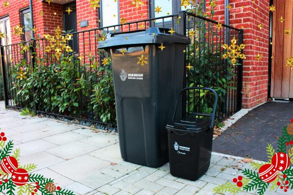 General waste bin and food waste caddy outside a red brick property