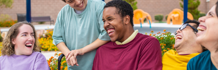 A group pf young people laughing