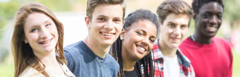 Line of young people arm in arm